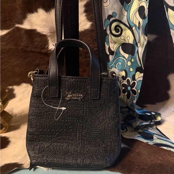 Juicy Couture Handbags - Juicy Couture Embossed Black Mini Bag